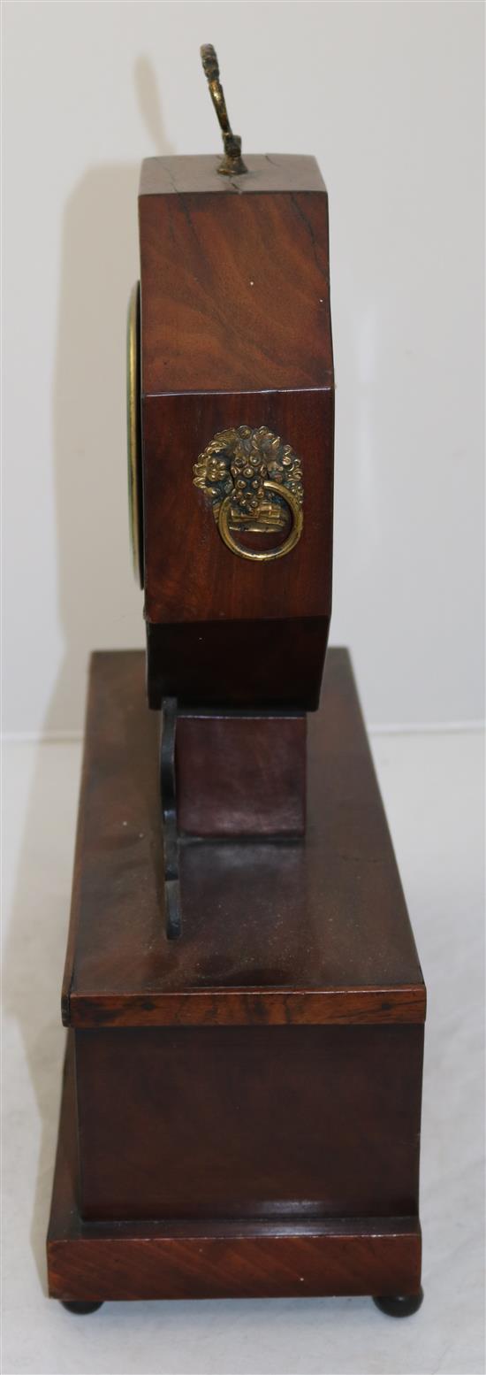 An early 19th century inlaid mahogany mantel timepiece, 16.5in.